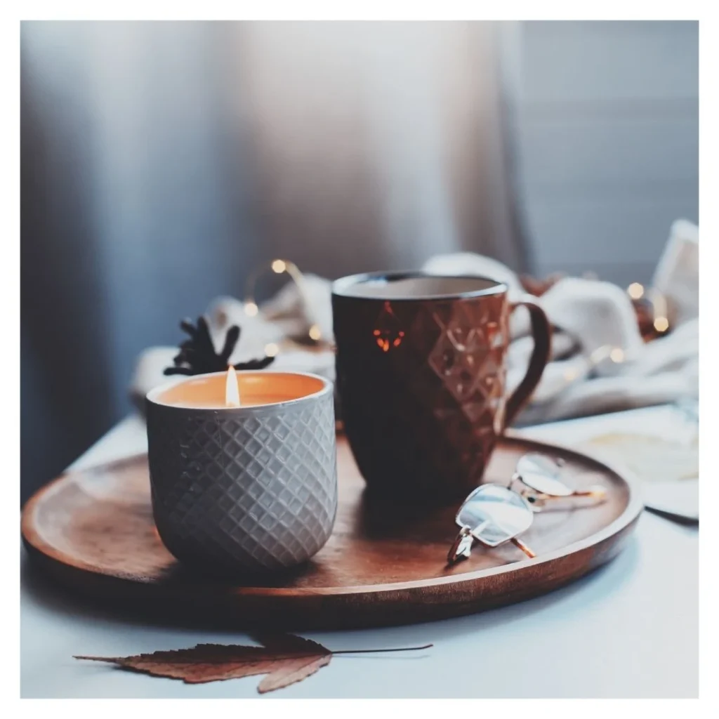 tea resting next to candle